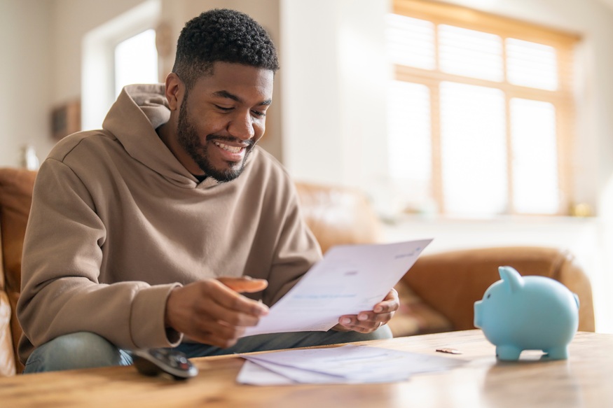 Student using student finance guidance and planning costs for higher education